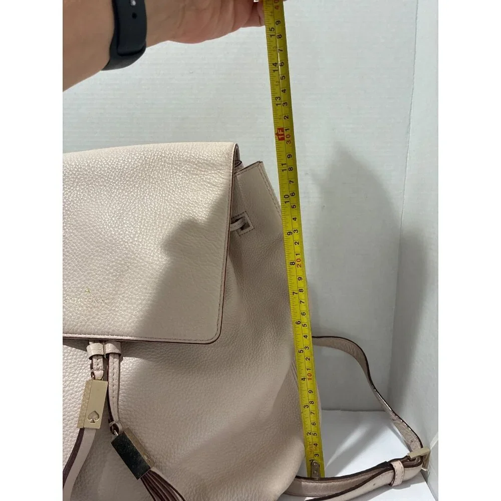 Kate Spade Pebble Leather Drawstring Flap Backpack Leather